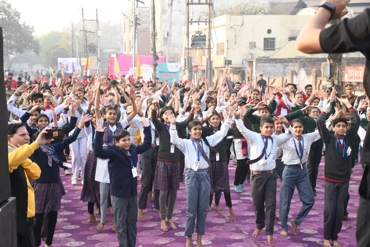 Students cheering during a street safety activity