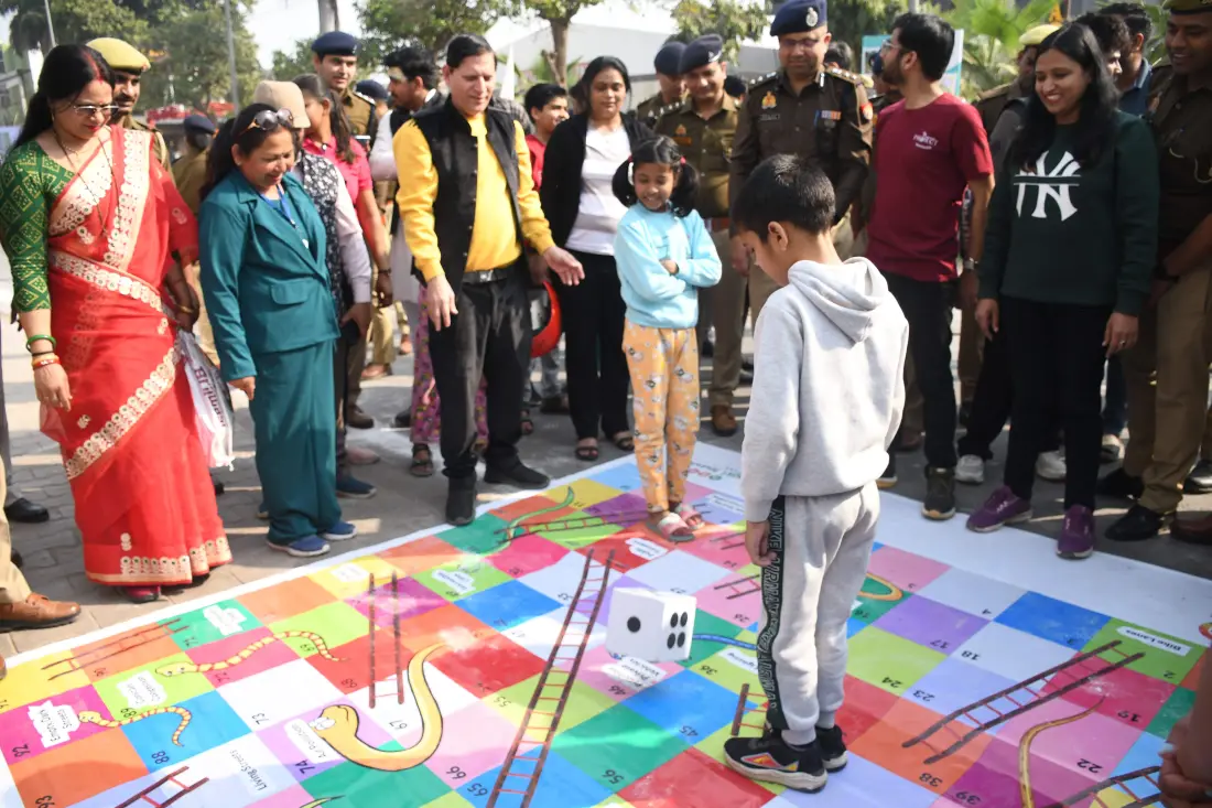 Elders and children playing a street game together