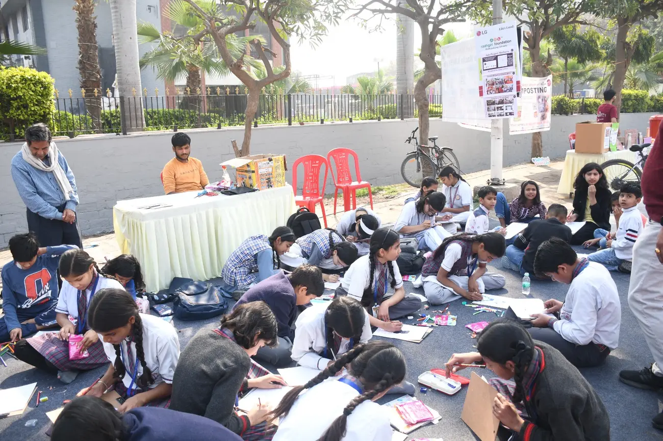Children taking part in a street activity during a community workshop in Mathura