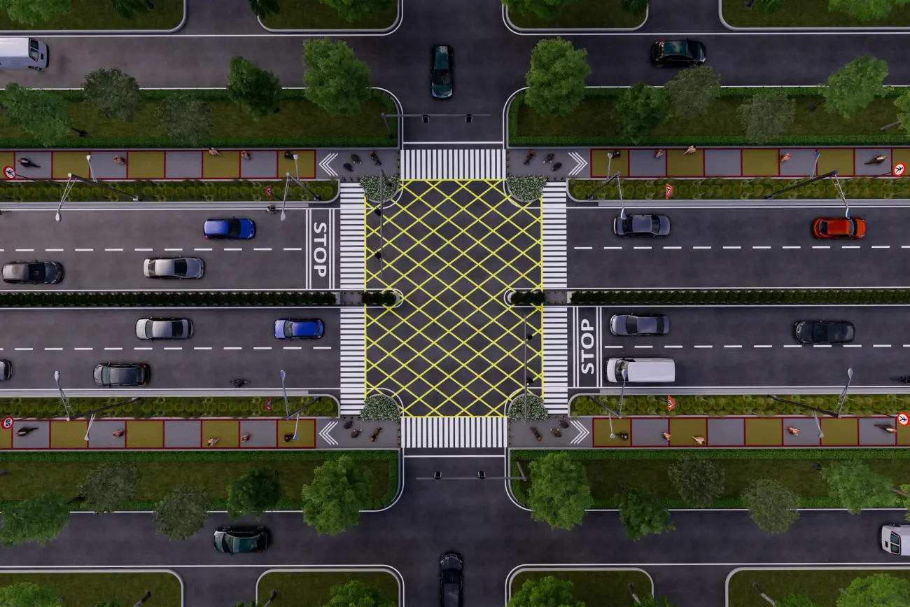 Aerial view of a redesigned road with clearly marked lanes and pedestrian space